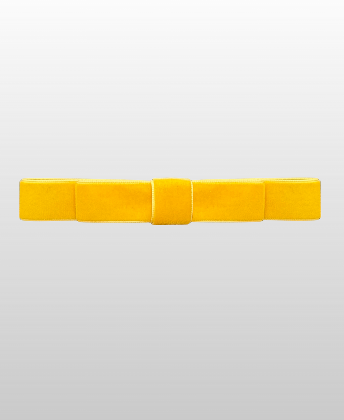 Confectionné en velours jaune, nœud minimaliste, délicatement formé.