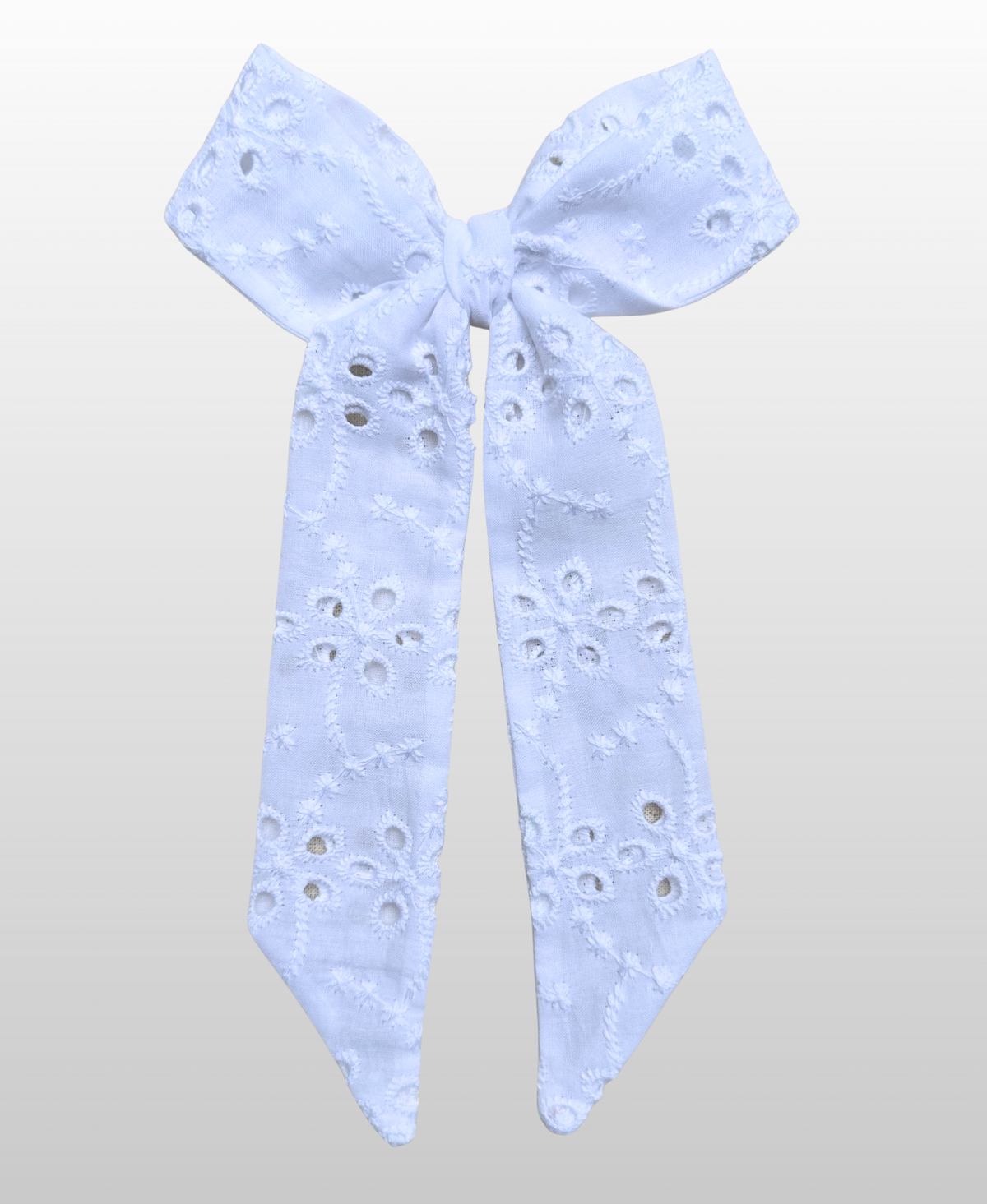 Nœud pour cheveux simple et léger, fabriqué à partir de broderie anglaise.